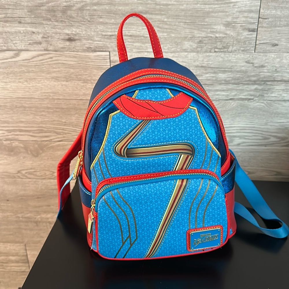 Brand new Loungefly Marvel Ms Marvel Cosplay Mini Backpack.